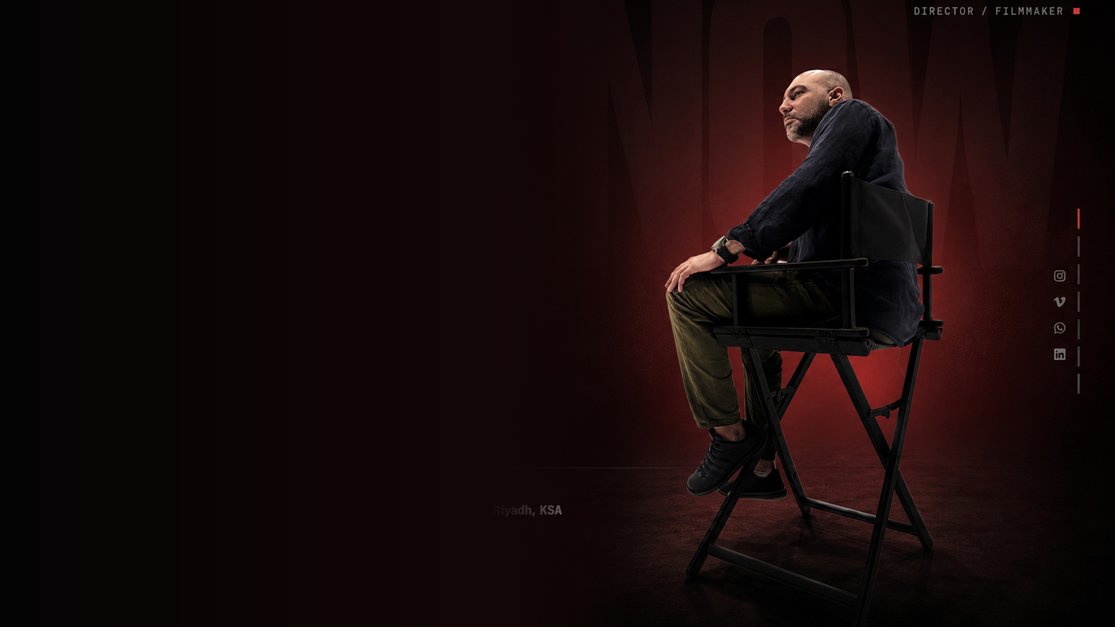 Gehad Abdel Nasser seated on a director's chair